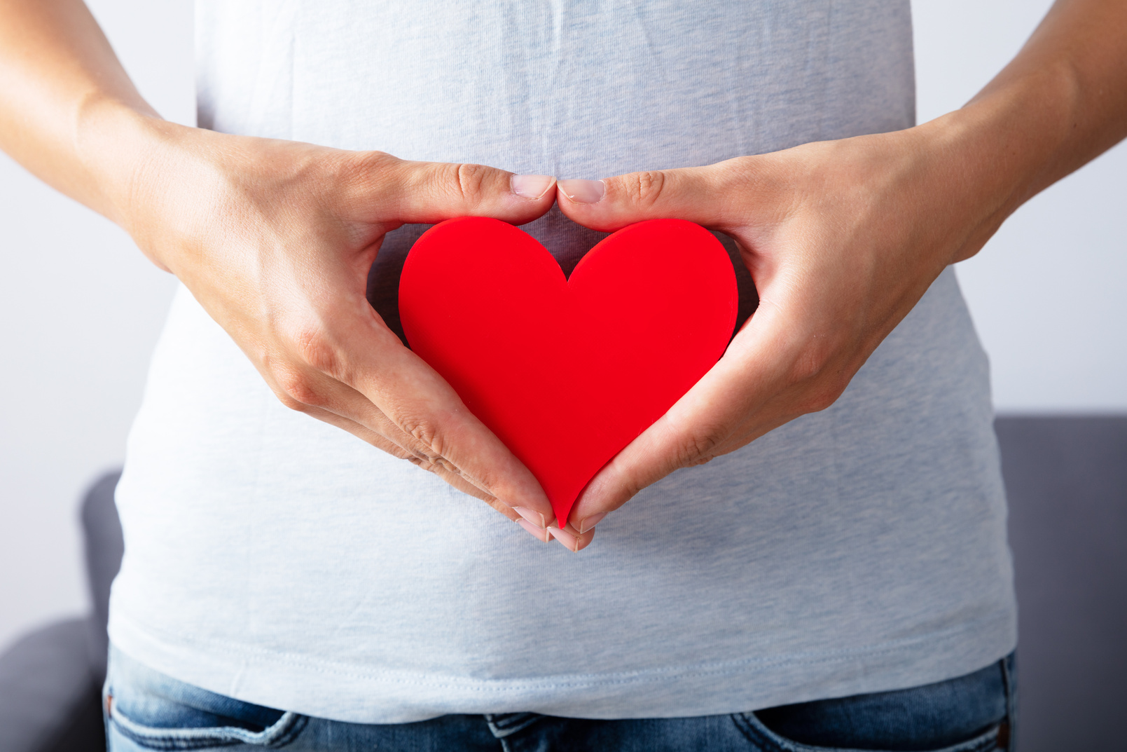 Woman Holding Red Heart