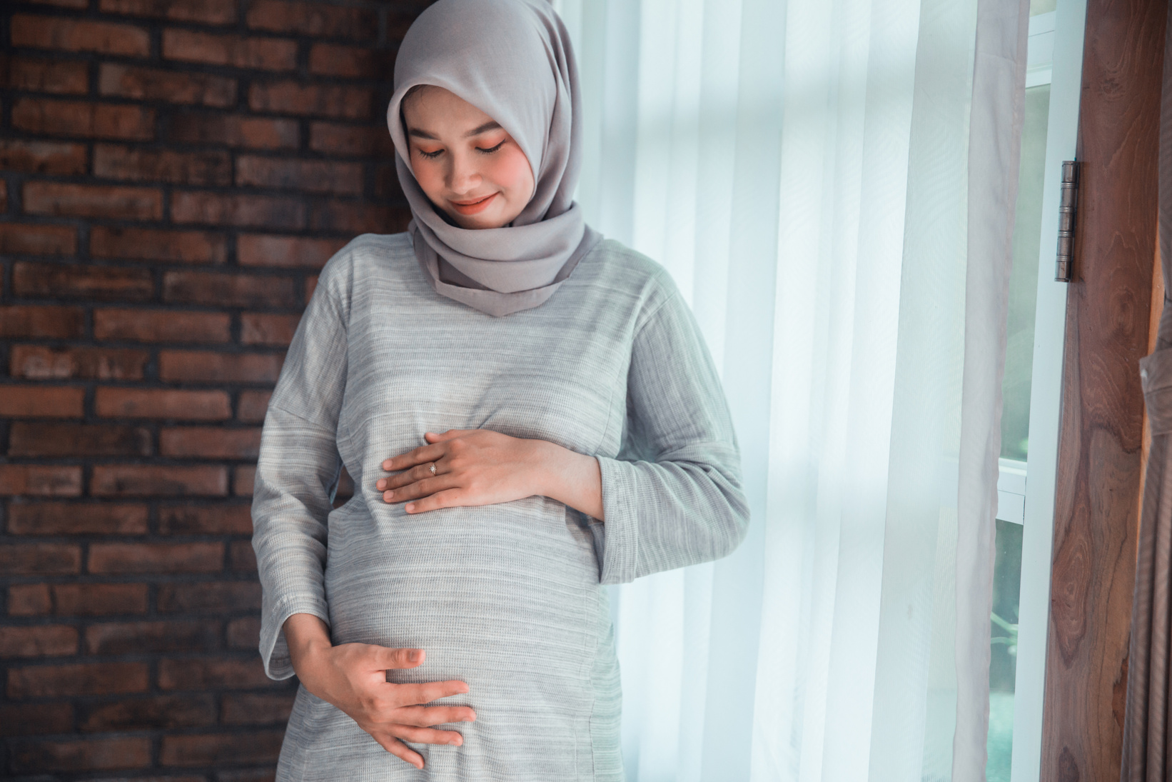 muslim pregnant woman asian